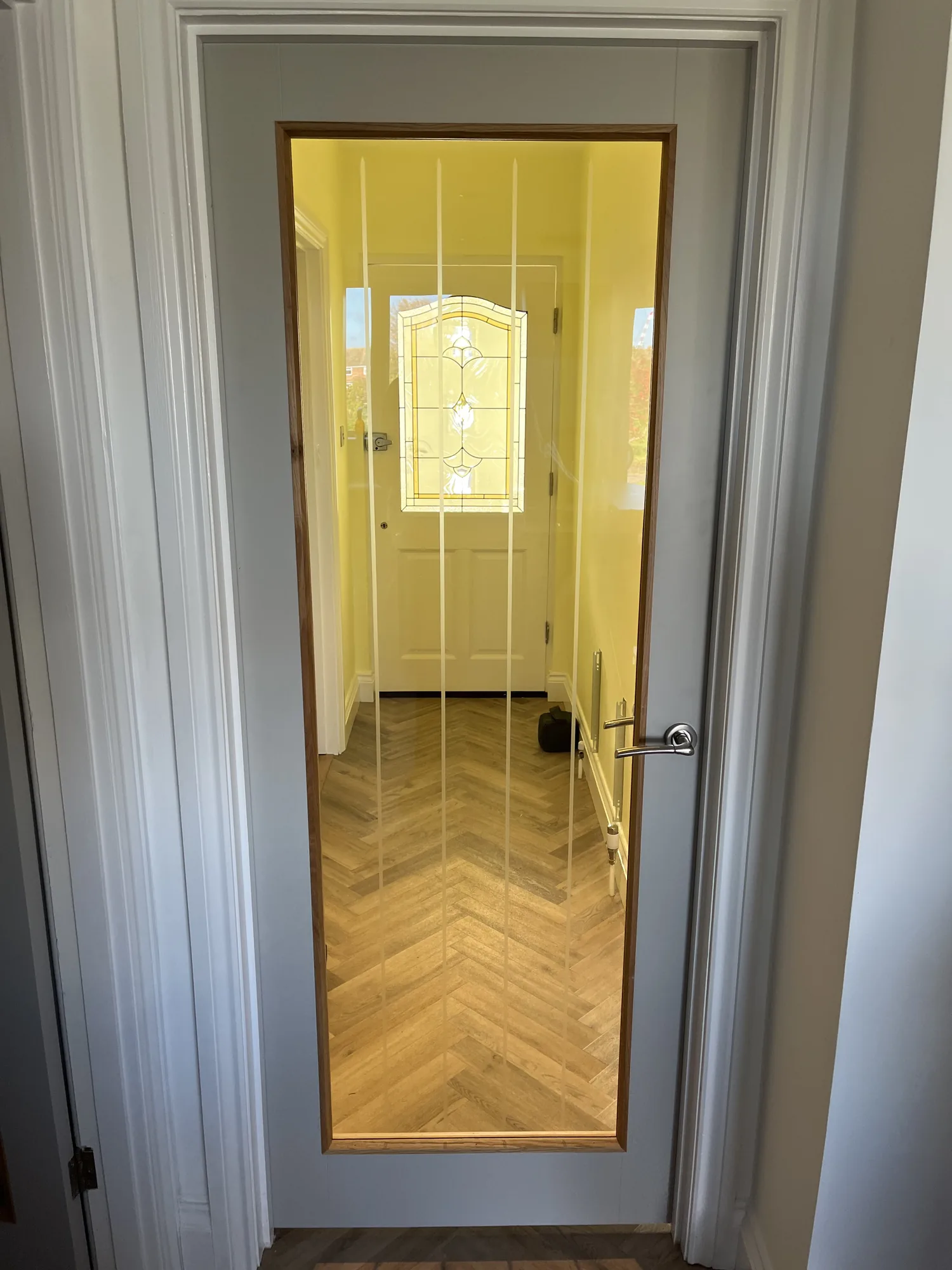 White painted shaker-style internal door with matching architrave