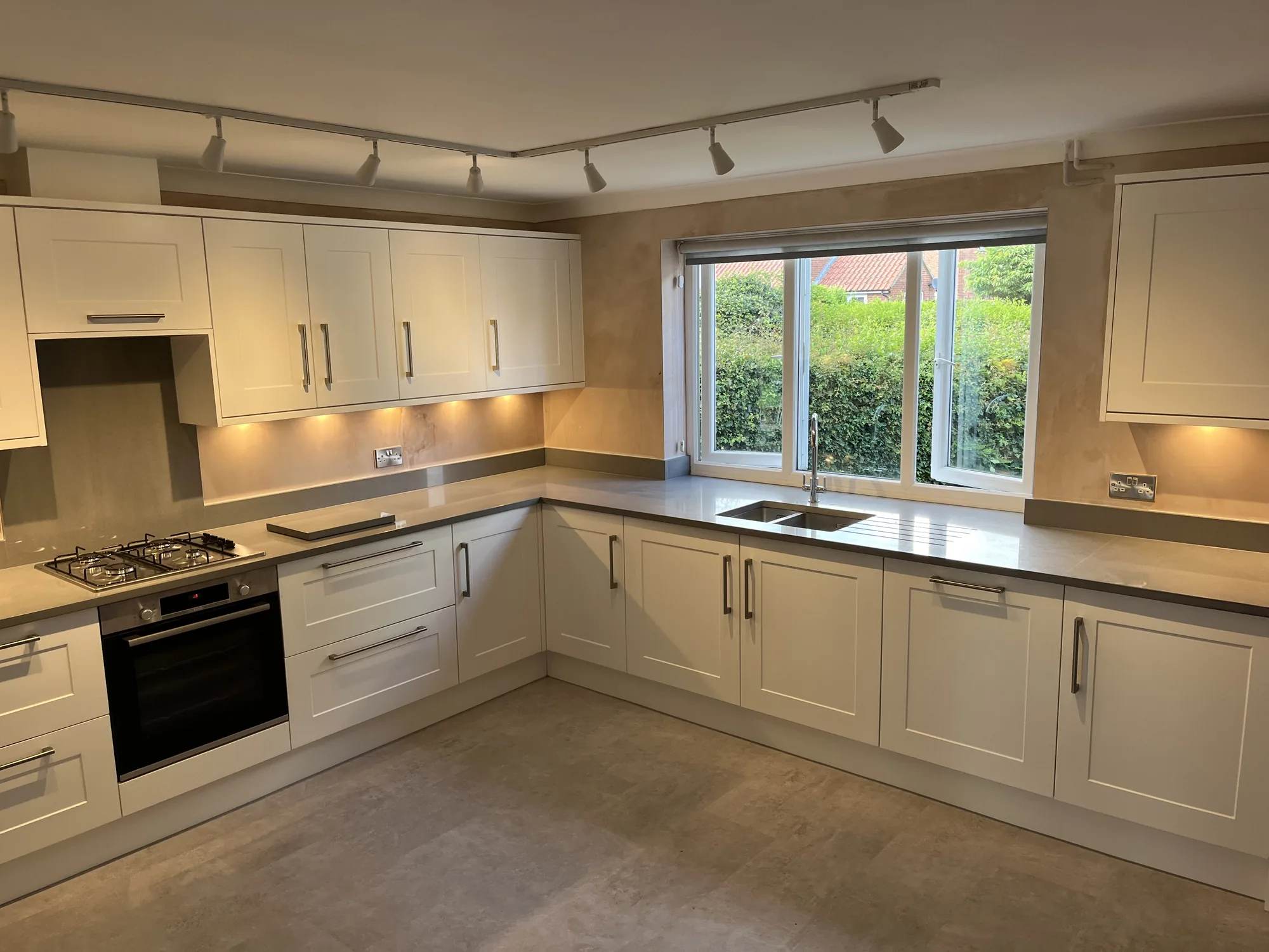 Bespoke kitchen island with breakfast-bar overhang, made by Chris Jones Joinery