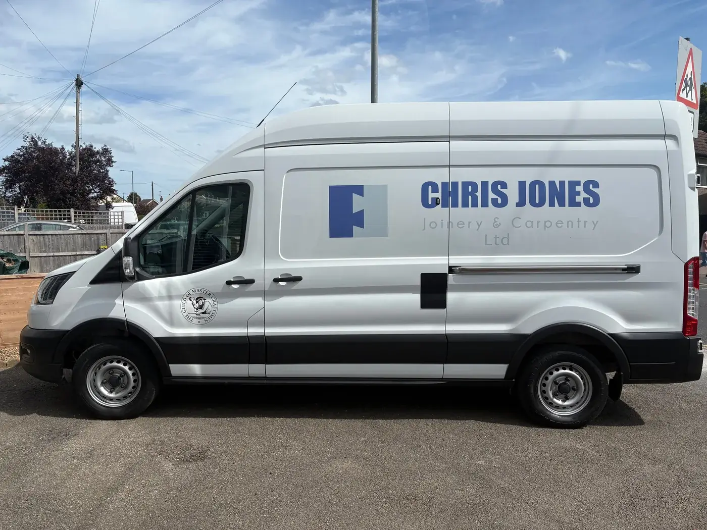 The Chris Jones Joinery & Carpentry van, signwritten with the Guild of Master Craftsmen badge, covering Harwich and NE Essex